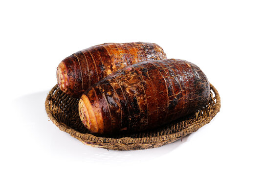 Fresh Guangxi Lipu Taro Roots in Wicker Basket Studio Photography