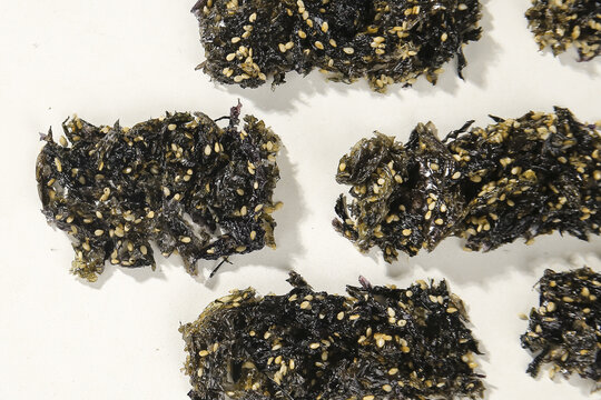 Japanese Seaweed Snacks with Sesame Seeds - Healthy Asian Food Ingredients on White Background