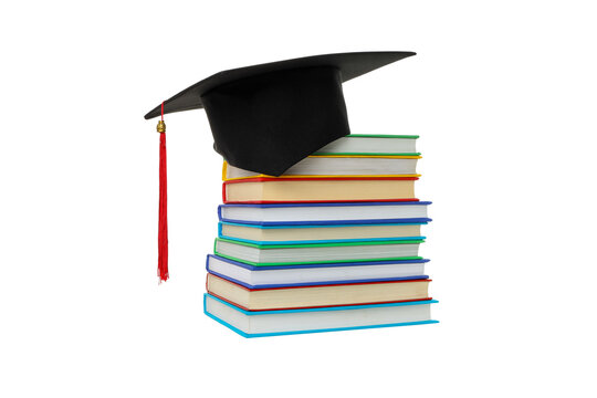 Books with a graduation cap on top, isolated on white, PNG