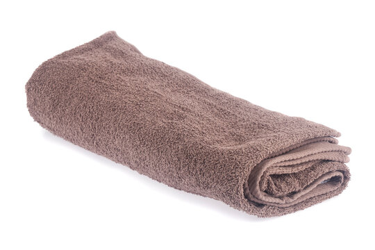 Brown towel isolated on white background.