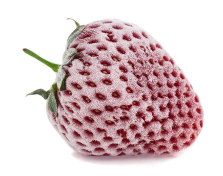 Frozen strawberries isolated on a white background.