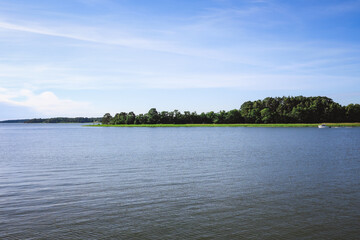 Obraz na płótnie Canvas Seacoast, picturesque views. There is an island in the open sea