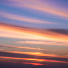 Fototapeta premium Sunset sky with vibrant clouds over horizon