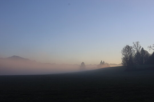 Misty Morning Landscape with Mountains and Forest