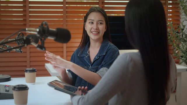 Podcast interview creator content storytelling microphone studio conversation recording radio, calm scene with coffee and tablet, warm light, wood blinds, intimate home setup, focused talk on media
