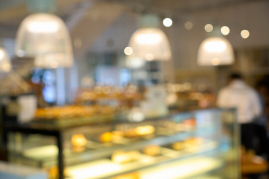 Bakery cafe interior with blurred display and lights