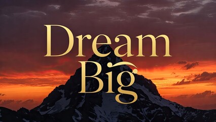 Obraz premium Inspiring mountain landscape with dream big quote at sunset symbolizing ambition and aspirations in nature's beauty