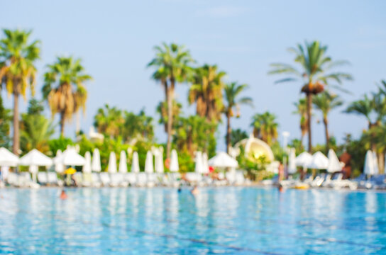 Abstract blur and defocus beautiful outdoor swimming pool in hotel resort for leisure relax in vacation
