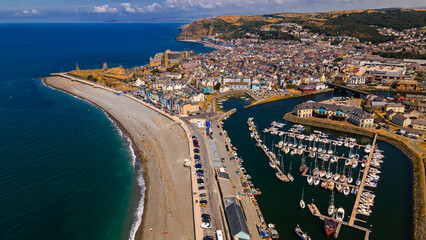 High aerial view of marina harbor boats beach and town coastline © Андрей Нелупов