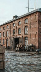 Fototapeta premium Historic Brick Warehouse with Dock and Wooden Barrels in a Maritime Setting