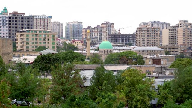 Urban cityscape view captured in Baku, Azerbaijan, showcasing the city's modern skyline, contemporary architecture, and vibrant metropolitan atmosphere in the heart of the country's capital.