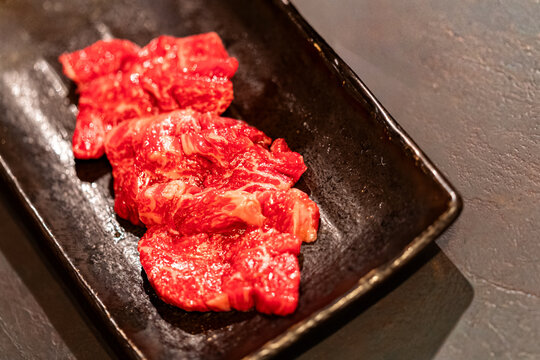 Japanese Raw Wagyu Beef on Black Ceramic Plate