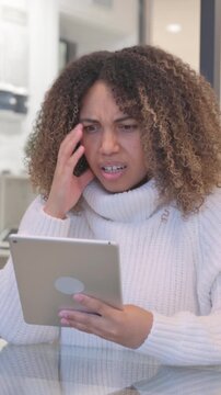 African Woman with Loss on Tablet in Office, Vertical Video