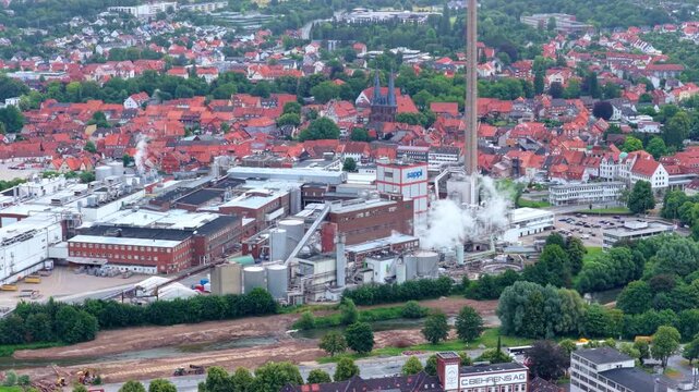 Alfeld, Lower Saxony, Germany - June 30, 2026: Aerial Video of Sappi Paper Mill in Alfeld, Lower Saxony