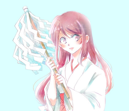 御幣を持っている巫女さん　笑顔