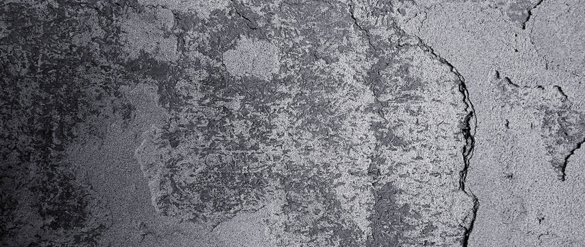 Grungy wall with large crack cement floor texture. cement large crack for dark background. not ai