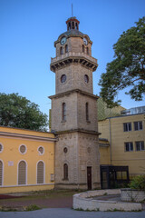 Obraz premium Historic stone clock tower in Varna Bulgaria against blue evening sky