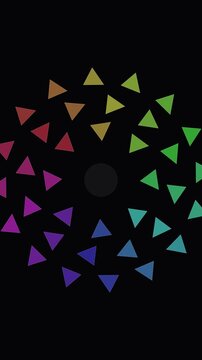 observing colorful triangular shapes rotating outward from a dark center