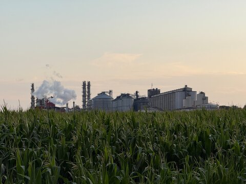 View of methanol and ethanol factory plant in corn field. Bioagra Goswinowice Ethanol Production Plant located near Nysa in Poland. Factory of bioethanol and ethanol produced from corn grain