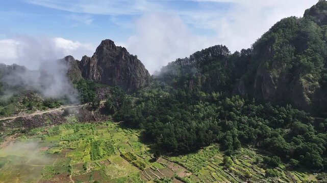 Santo Antao Island, Cape Verde. Drone Shot of Agricultural Fields in Valley Under Volcanic Hills and Clouds