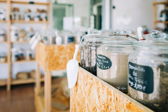 Glass jars with bulk food in a zero waste grocery store