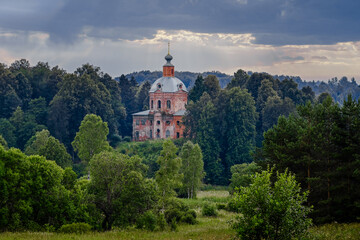 Fototapeta premium Abandoned Smolensk church in a dense forest near the village of Bogoroditskoye, Smolensk region of Russia