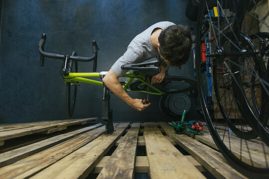 Mechanic working on bicycle