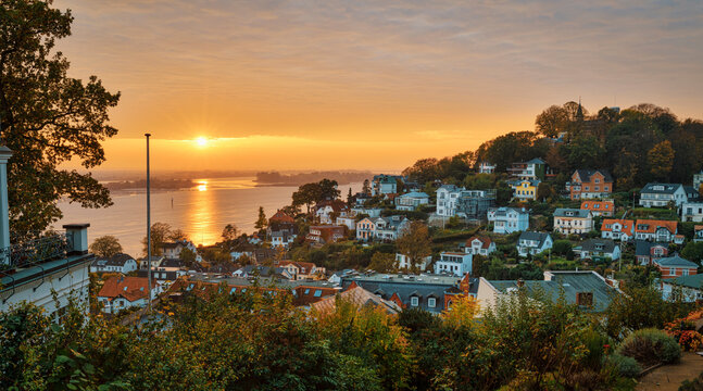 Germany, Hamburg, Suburban houses and Blankenese at sunset