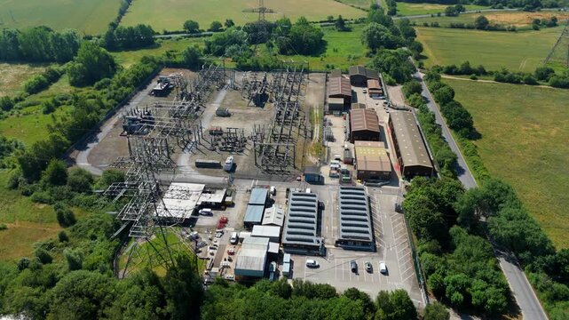 Aerial view of Thorpe Marsh power grid substation contrasting energy infrastructure and green landscape