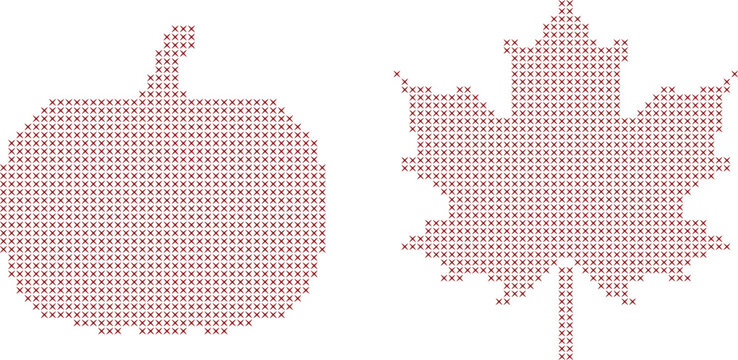 Cross stitch pumpkin and maple leaf isolated on white background