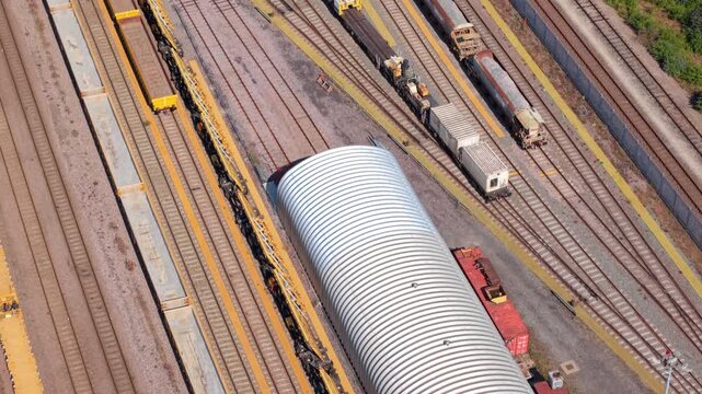 Close aerial view of a major railway junction and train maintenance yard in central Doncaster, UK