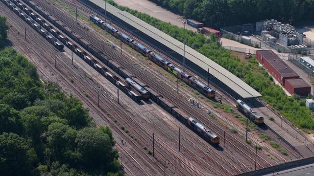 Aerial view of freight train wagons and locomotives on railway sidings in Doncaster UK