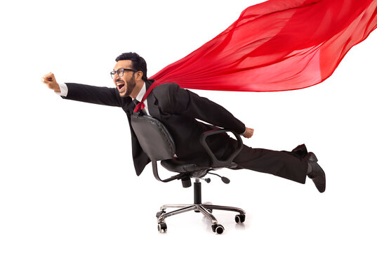Corporate employee in formal business suit flying like superman lying on chair.
