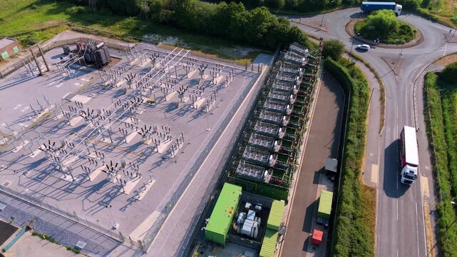 Aerial view of industrial generator compressor units for power generation at small electrical substation