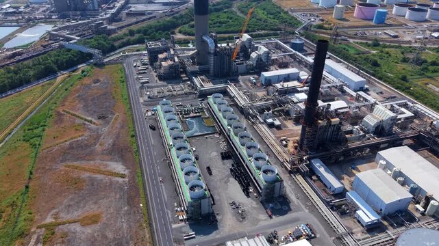 Close up aerial view of power station cooling towers with rows of forced draft ventilation fans