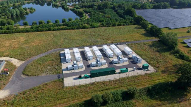 Close up aerial view of small battery energy storage system BESS cells for power grid stability