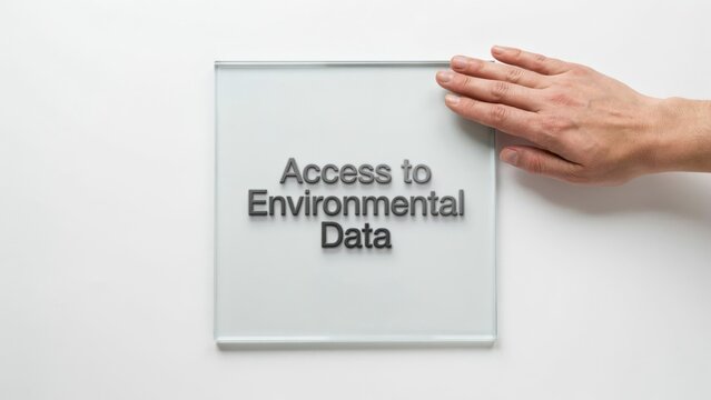 Conceptual image of a human hand accessing environmental data on a transparent digital interface for sustainability