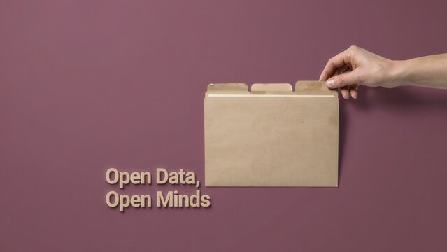 Hand holding manila folder on purple background with open data open minds text