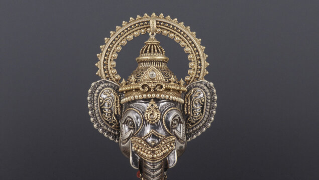 Ornate metal statue of hindu deity with crown sculpture tradition religious spirituality decoration blessing mythology sculpted traditional craftsmanship artistic showpiece ornament