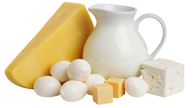 Assortment of dairy products including cheese wedges balls cubes, and a milk jug