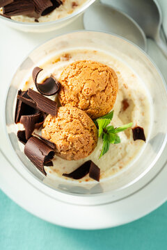 Italian Semifreddo Dessert in a Glass with Mascarpone, Whipped Cream, Sweetened Condensed Milk, Amaretti Cookies and Chocolate, Macro