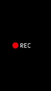 Minimal REC recording red dot, white text, black empty space. Perfect for camera videos, live stream overlays, security screens, broadcast graphics, video tutorials, motion graphic templates.