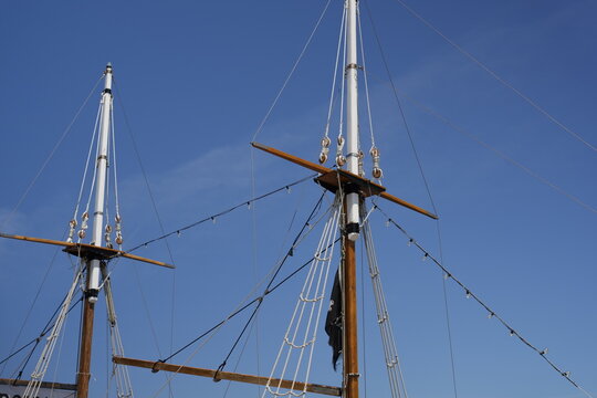 Sailing Vessel Masts And Rigging Against Blue Sky