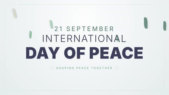 International Day of Peace text animation with falling confetti on a white background