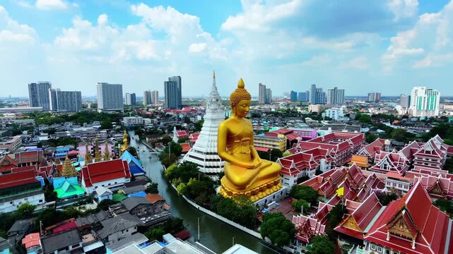 主推英文标题（突出环绕运镜与主体）：
Aerial orbit shot circling around Giant Golden Buddha statue and white pagoda at Wat Paknam, Bangkok, Thailand