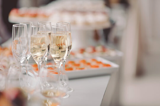 Celebration of flavors and textures at a festive gathering with sparkling drinks and delightful treats