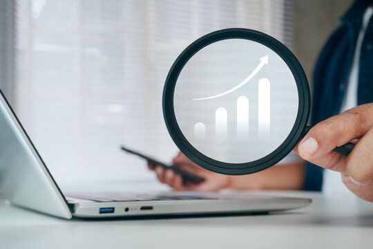 Business professional analyzing digital profit dashboard with virtual financial chart on laptop for profit analysis, profitability measurement, business performance evaluation, financial insights