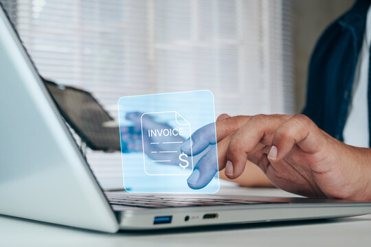 Business professional managing digital invoices on laptop with virtual invoice document interface for invoice management, billing process, payment tracking, accounts receivable, bookkeeping, finance