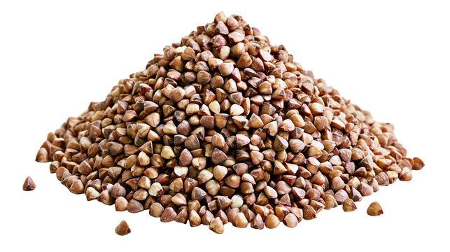 Pile of raw buckwheat groats with triangular shape