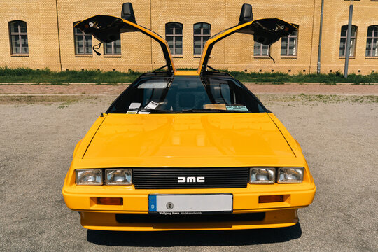 Yellow DeLorean DMC-12 Front View with Raised Gullwing Doors